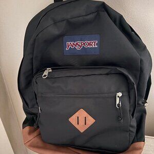JanSport Black Backpack with Brown Leather Trim